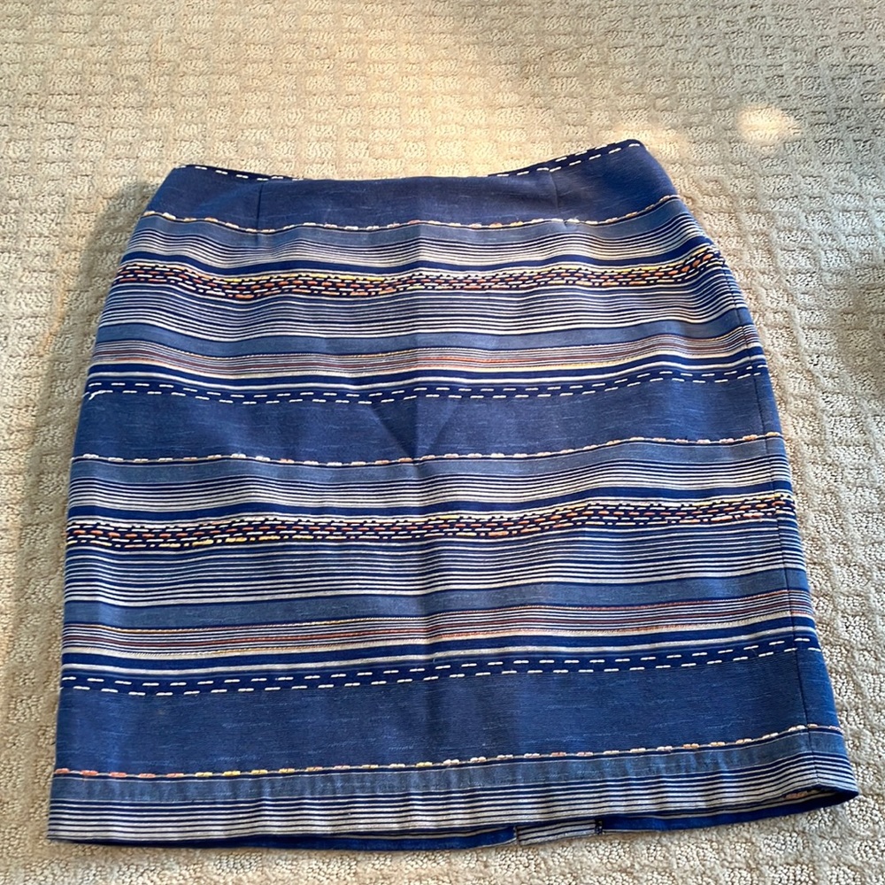 Fun striped and embroidered denim look skirt with back zip.